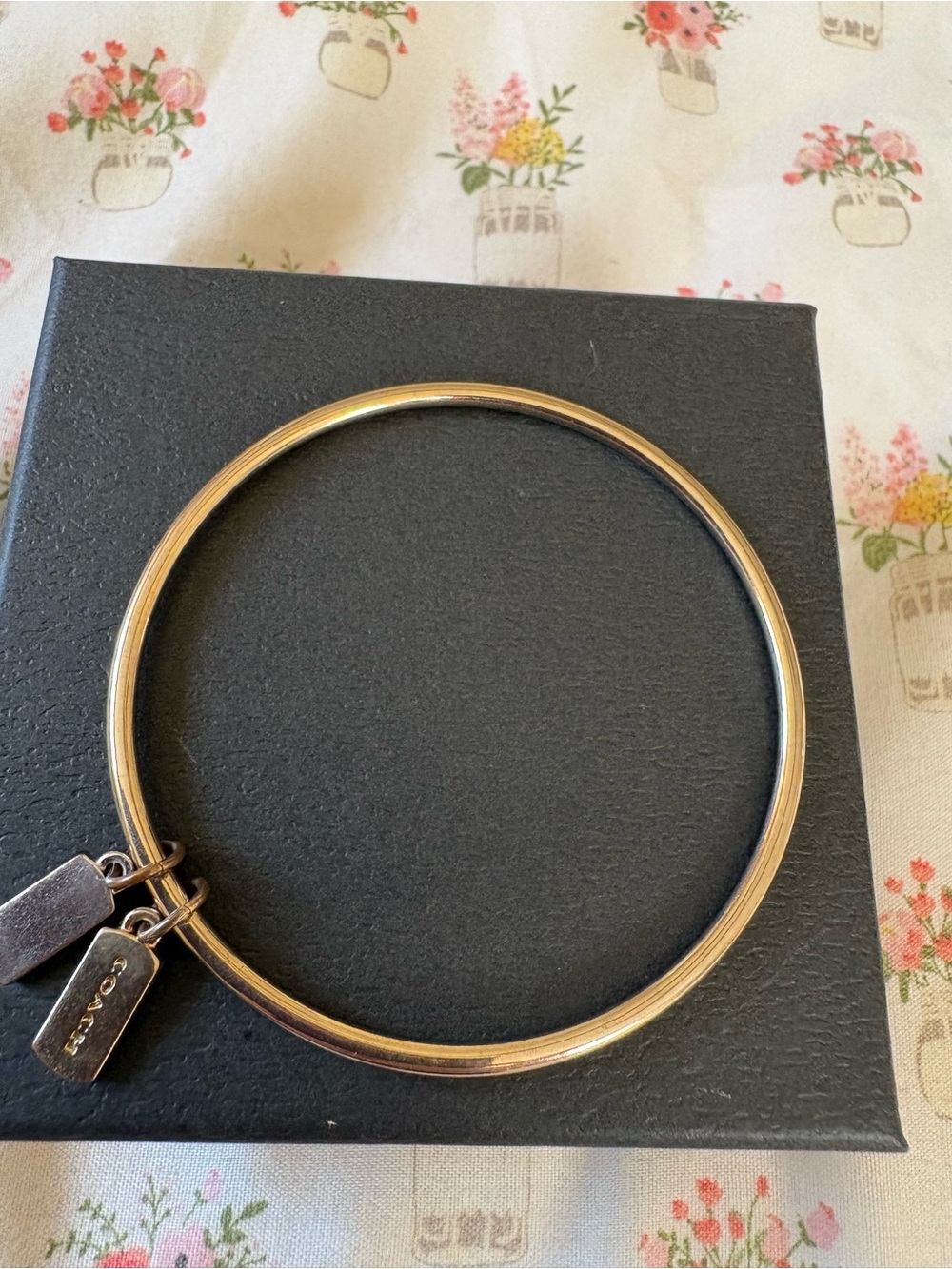 Coach Gold Tone Women's Bangle Bracelet - Elegant Stackable Bracelet.